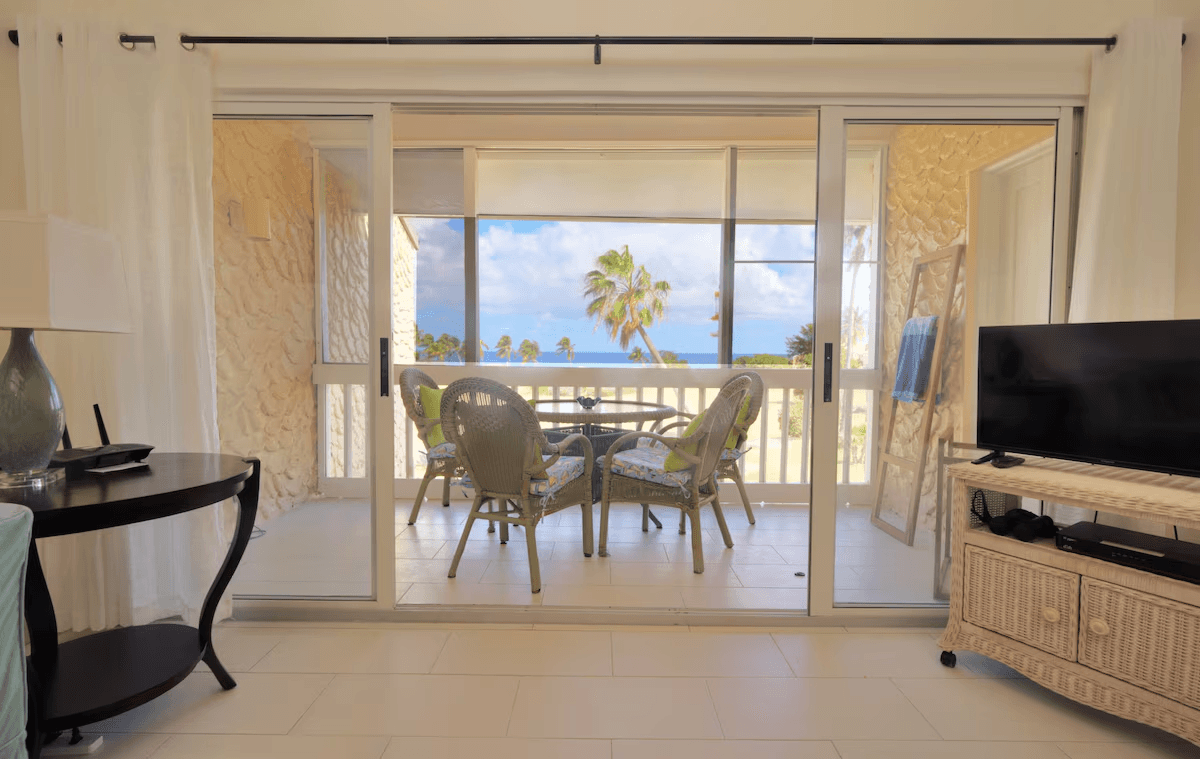 The Screened In Porch View From The Living Room To The Caribbean Sea.